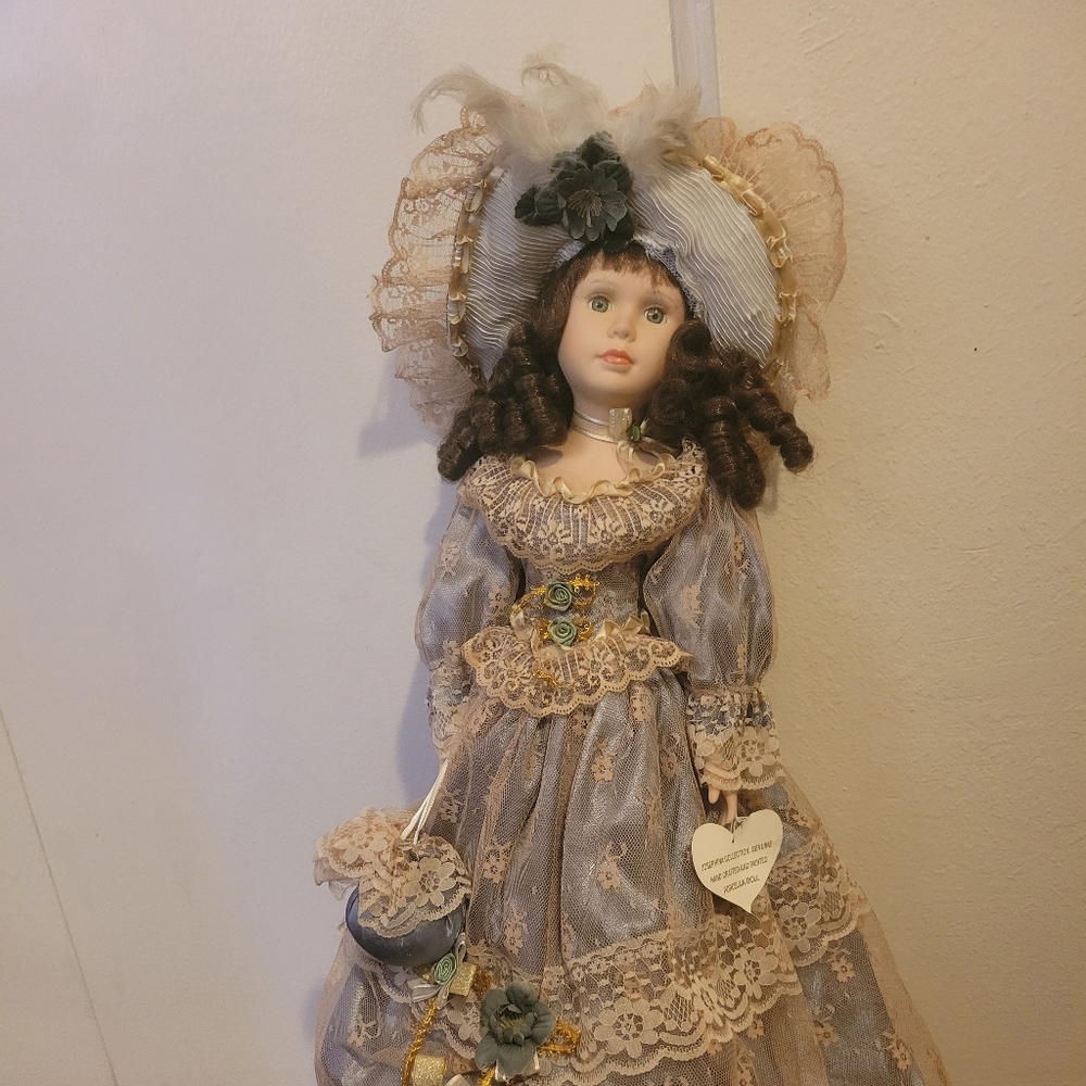 Tall porcelain doll